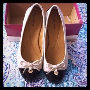 Cream and black ballet flats